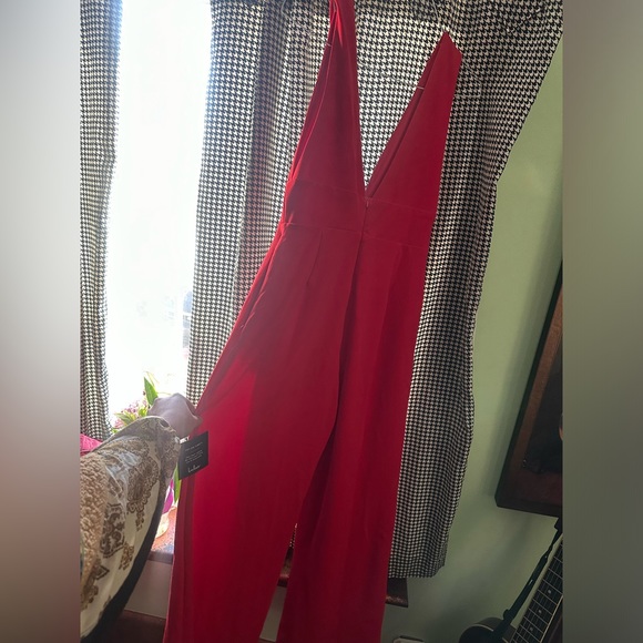 Red jumpsuit from Lulu’s, NWT. - Picture 2 of 2